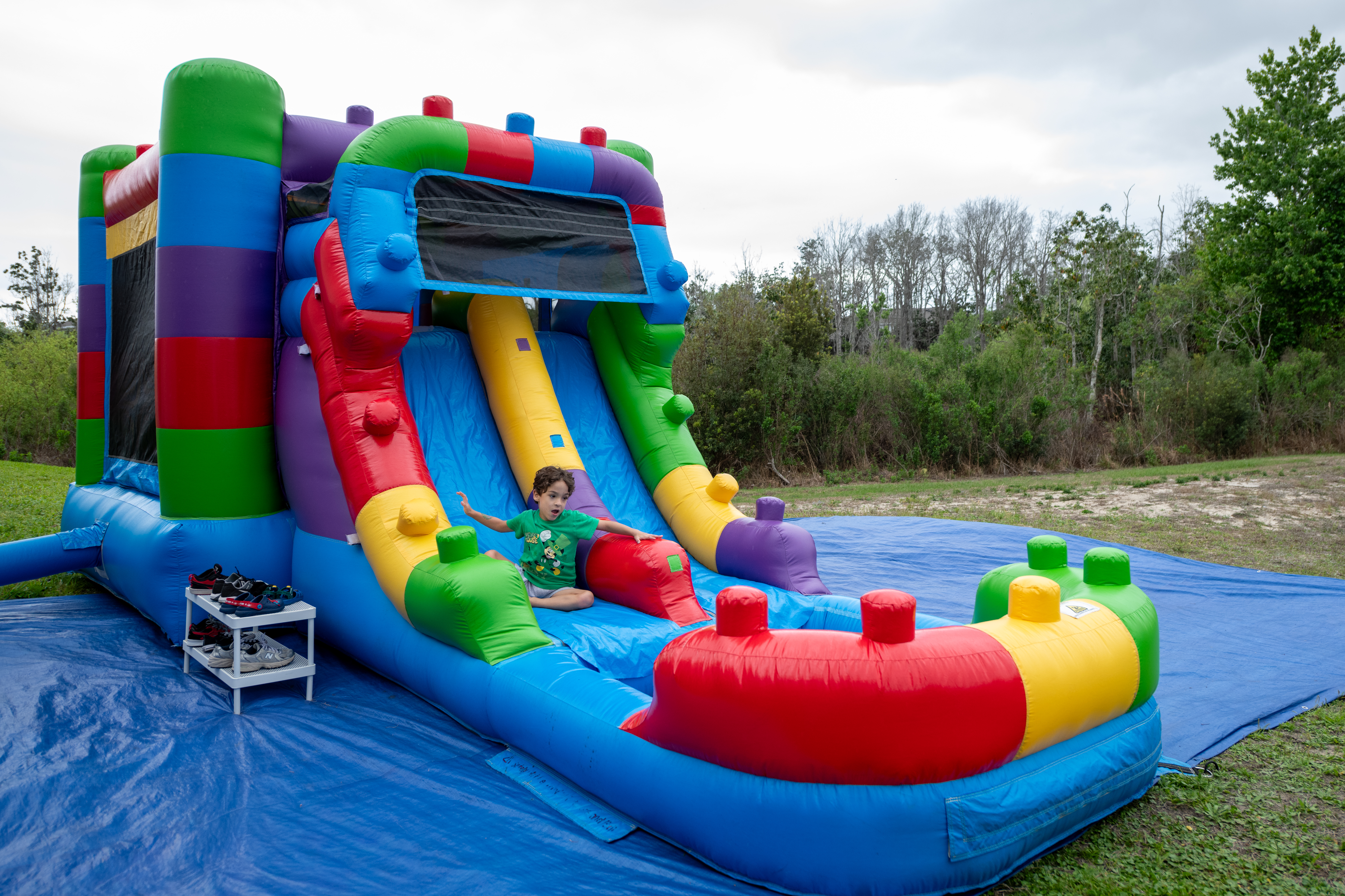 Lego-themed bounce house with extra room for energetic group play
