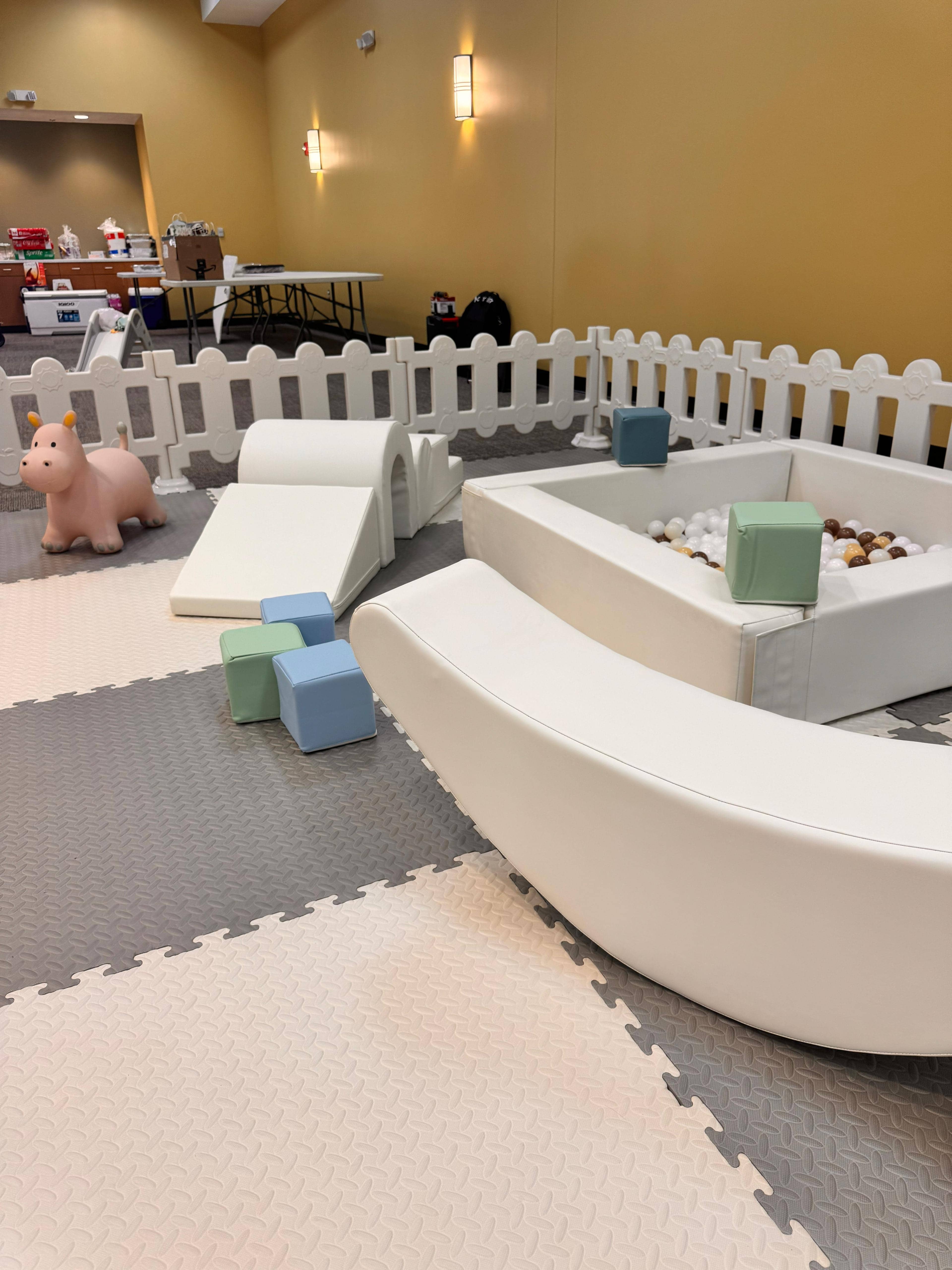 Little Explorer indoor soft play with foam ramp, ball pit and colorful foam blocks — toddler party rental in Central Florida